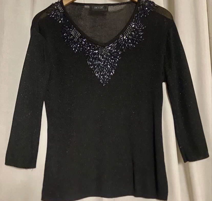 JACCOS Black Beaded V-Neck Shimmer Blouse (Category: Blouses) located in Caloocan City. Submitted by declutteringph. (Listing ID 1467202480, Image 2). Description: No Size on the tag! Measurements: Dimension (inches) Shoulder - 18” Pit to pit - 19” Length - 25” Sleeve Length - 17”.