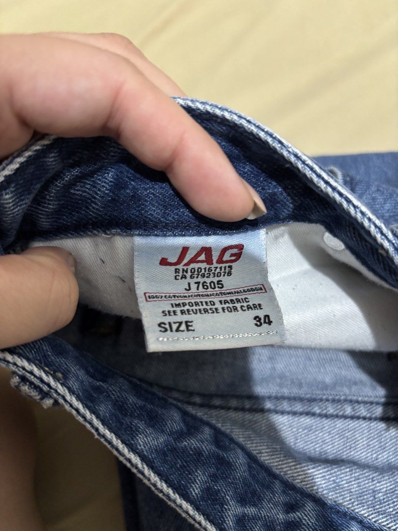 JAG Denim Jeans Size 34 (Category: Jeans) located in Pasay City. Submitted by _mcrnj (Listing ID 1467324195, Image 3). Description: - Brand: JAG - Style: Wide leg - Color: Medium blue wash - Size: 34 - Material: 100% cotton (sturdy and durable fabric) - Details: Classic five-pocket design, button fly, standard belt loops, contrast stitching on back pockets, and leather patch on back waistband - Condition: Great quality, ready to wear.