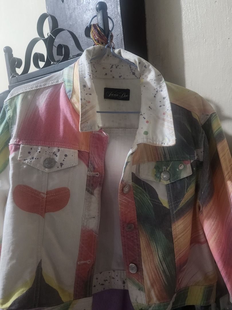 Jane Doe Abstract Paint Splatter Denim Jacket (Category: Coats, Jackets and Outerwear) located in Manila. Submitted by oshangdeep (Listing ID 1467279760, Image 1). Description: - Brand: Jane Doe - Style: Statement denim jacket with vibrant abstract paint splatters and brush strokes - Color: Multicolor - Features: Front button closures, dual chest pockets, and splatter details on the collar - Fit: Unstructured, lightweight, and great for layering 