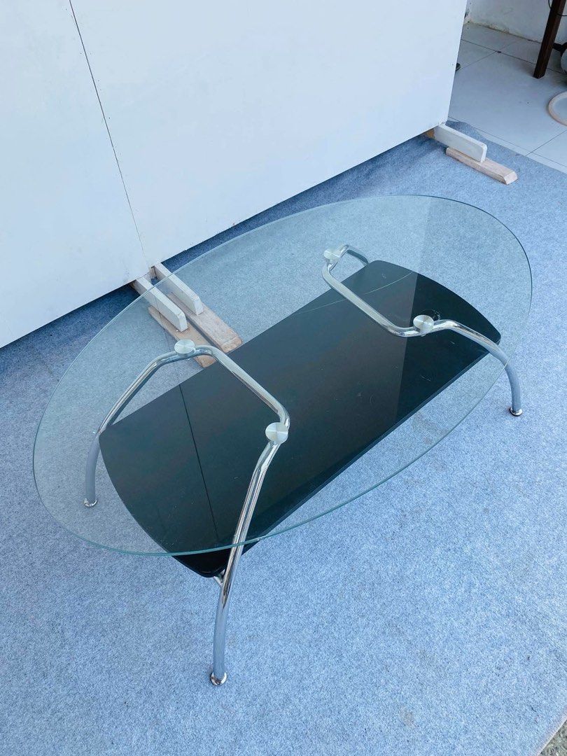 “JAPAN SURPLUS” GLASS CENTER TABLE (Category: Tables & Sets) located in Manila. Submitted by jerichocal17856 (Listing ID 1467212825, Image 2). Description: “JAPAN SURPLUS” GLASS CENTER TABLE SIZE: 39.5L” x 24W” x 16H” inches (AS-IS ITEM) IN GOOD CONDITION.