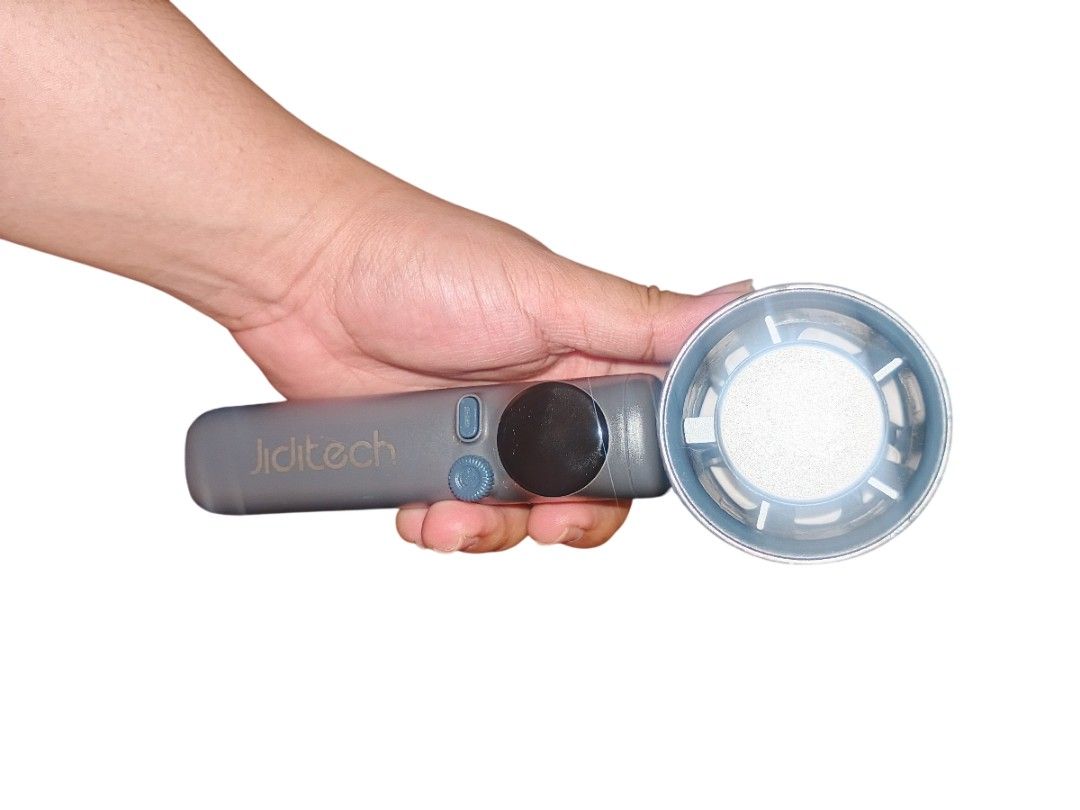 Jiditech Handheld Electric Fan JD-SS026 with Box (Category: Fans) located in Manila. Submitted by harpercbrr36253 (Listing ID 1467276762, Image 3). Description: - BAWAL SA MAARTE, SELLING IT AS IS - Model: Jiditech JD-SS026 Handheld Turbine Fan - Color: Sleek grey and blue design - Condition: Tested and fully working - Power: Rechargeable battery-powered - Inclusion: Comes with original box and wrist lanyard strap - Perfect for daily commuting an