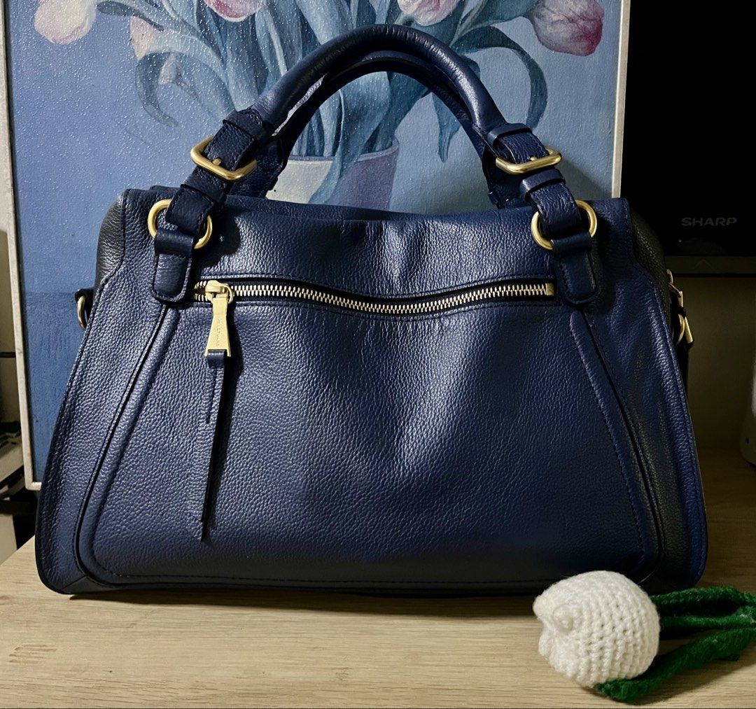 Jills Stuart bag (Category: Cross-body Bags) located in Quezon City. Submitted by madshoppe (Listing ID 1467259545, Image 3). Description: No flaws Med size Navy blue and black With sling Super nice leather Brass gold hardware.