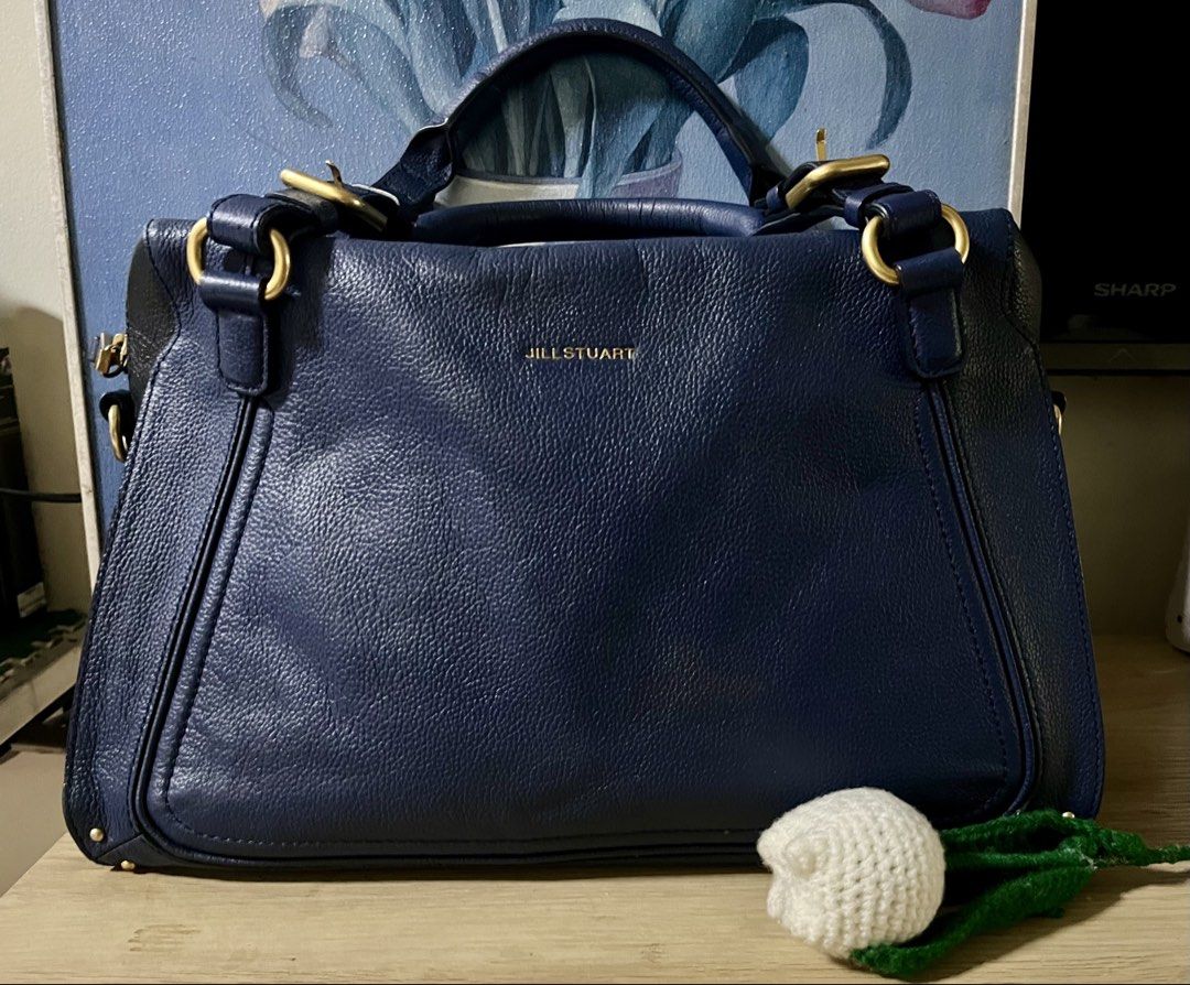 Jills Stuart bag (Category: Cross-body Bags) located in Quezon City. Submitted by madshoppe (Listing ID 1467259545, Image 1). Description: No flaws Med size Navy blue and black With sling Super nice leather Brass gold hardware.