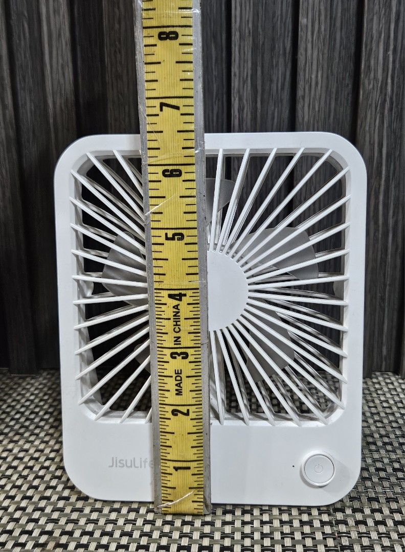 Jisulife Table Fan Life1 FA26 (Category: Fans) located in Rizal. Submitted by cherry_garcia (Listing ID 1467242827, Image 3). Description: - Model: Jisulife Life1 FA26 Table Fan - Color: White - Size: Approx. 7" tall x 5" wide (compact & portable) - Features: Foldable stand, USB rechargeable - Inclusions: Original box, charging cable, and user manual - Condition: Excellent, great for desks and bedside tables.