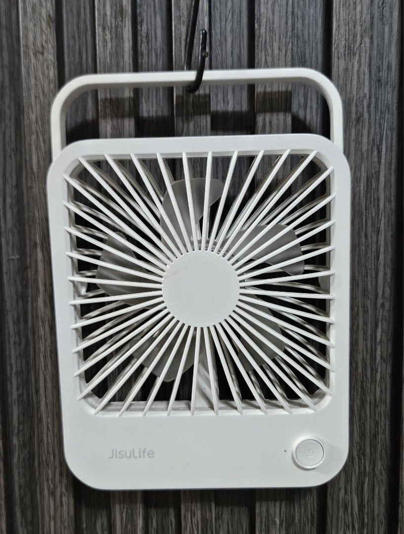 Jisulife Table Fan Life1 FA26 (Category: Fans) located in Rizal. Submitted by cherry_garcia (Listing ID 1467242827, Image 2). Description: - Model: Jisulife Life1 FA26 Table Fan - Color: White - Size: Approx. 7" tall x 5" wide (compact & portable) - Features: Foldable stand, USB rechargeable - Inclusions: Original box, charging cable, and user manual - Condition: Excellent, great for desks and bedside tables.
