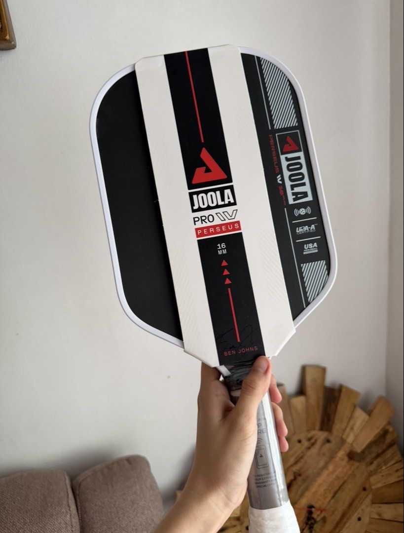 joola pickleball paddle (Category: Racket and Ball Sports) located in Cavite. Submitted by lovedbynics.official (Listing ID 1467274176, Image 1). Description: - Brand: JOOLA - Model: Pro IV Perseus (Ben Johns Signature Edition) - Thickness: 16mm - Condition: Brand new, unused - Packaging: Original paper wrap still intact on handle and face - Ready for immediate court use.