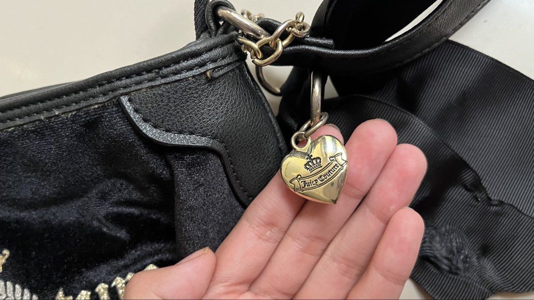 Juicy Couture sling bag (Category: Cross-body Bags) located in Manila. Submitted by iayo.15 (Listing ID 1467261469, Image 2). Description: This is an authentic piece, bought it from abu dhabi, UAE a few years ago! this is negotiable:)) RFS: moving out of the country(pretty pls buy my stuff).