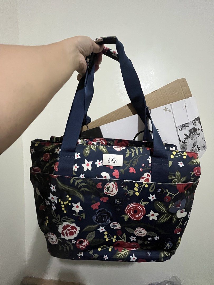 Jujube Encore Tote (Category: Diaper Bags & Wetbags) located in Manila. Submitted by warmfalcon.6e433b (Listing ID 1467286879, Image 2). Description: Decluttering this cutie. Jujube Encore Tote Fourre. Machine washable, with diaper changing pad. Pasabuy from US, limited edition print - midnight posy. Never used. Super kikay print Perfect for Mommies who love prints and bold colors. Photos 1-3: actual item Photos 4-5: details from website Bought f