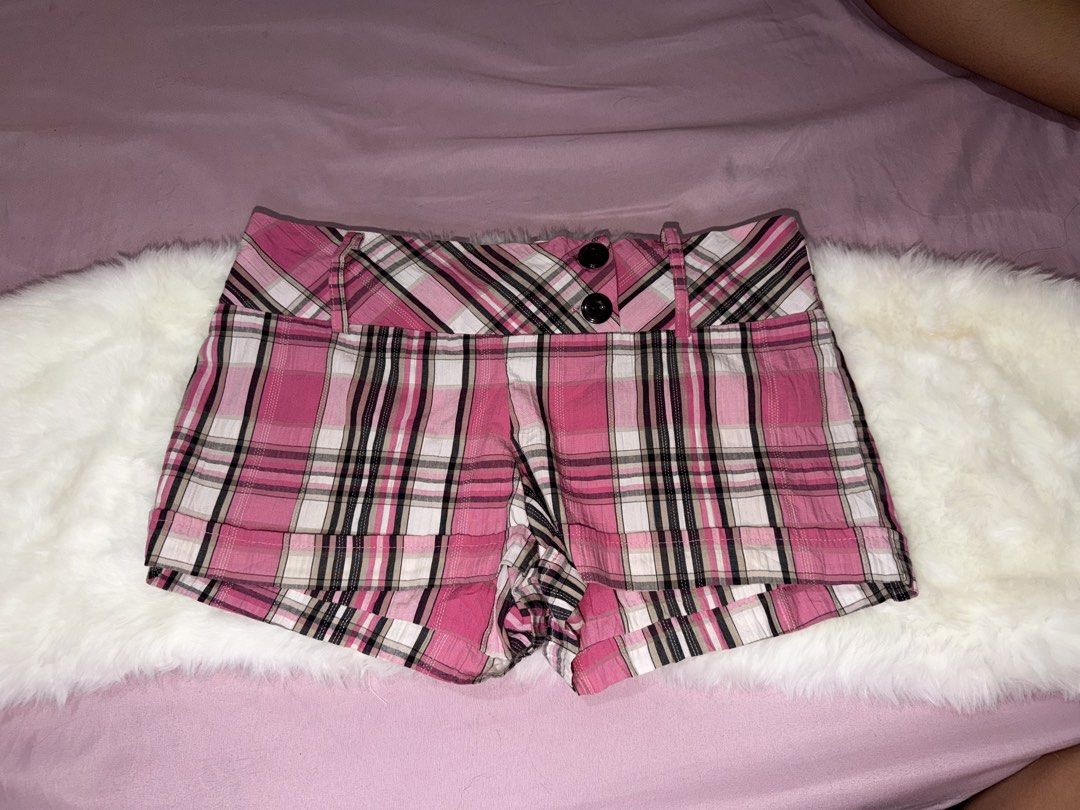 Juniors Rule Holliday's Pink Plaid Shorts Size 9 (Category: Shorts) located in Manila. Submitted by maureenn10 (Listing ID 1467196708, Image 1). Description: - Brand/Style: Juniors Rule Holliday's plaid shorts - Colorway: Pink, black, and white plaid - Size: 9 - Material: 99% cotton for comfort - Details: Dual black front button closure, belt loops, and stylish folded cuffs at the hem - Condition: Great pre-loved condition (ready to wear!).