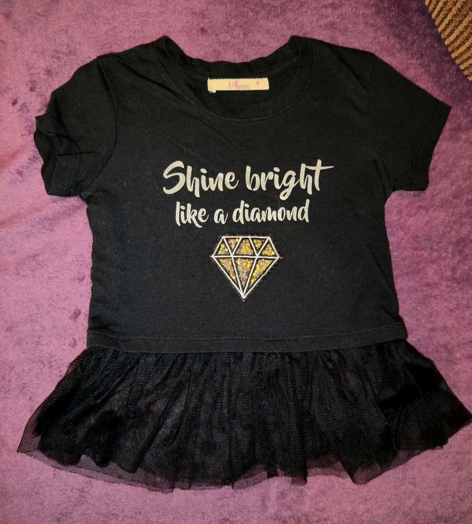 JusTees Kids blouse shirt Size 2-4 (Category: Babies & Kids Fashion) located in Manila. Submitted by jilliese (Listing ID 1467190923, Image 1). Description: Fit 2-4 like new - Material: Soft cotton top with fluffy tulle skirt overlay - Design: Black short-sleeve top with silver 'Shine bright like a diamond' text and a sparkly sequin diamond patch - Occasion: Great for parties or everyday wear - Condition: Excellent pre-loved condition (ready to w