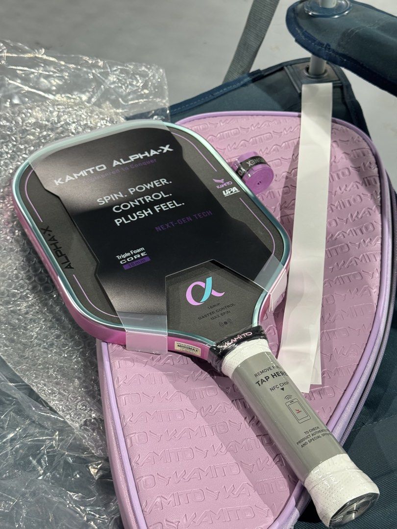 Kamito Alpha-X Pickleball Paddle 16mm (Category: Racket and Ball Sports) located in Manila. Submitted by lynettedec88739 (Listing ID 1467194785, Image 1). Description: Kamito Alpha-X pickleball paddle in 16mm core thickness. Purple frame design. Triple foam core tech for spin, power, and control. UPA pro certified. Paddle length 418mm, width 190mm, handle length 145mm. Average weight 225g. NFC chip on grip for authenticity verification. Includes 