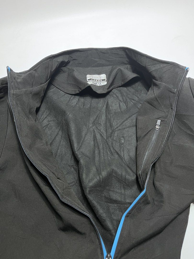 Kappa Alpine F1 Team Softshell Jacket Black Size L (Category: Coats, Jackets and Outerwear) located in Iloilo. Submitted by fromthebins.ilo2 (Listing ID 1467358631, Image 3). Description: - Authentic Kappa Alpine F1 Team softshell jacket in sleek black - Size: Large (GARA collection tags) -22/28 dimensions - Features official sponsor logos including BWT, Castrol, Microsoft, Pirelli, Binance, and Mobilize - Eye-catching blue zip tape on full front