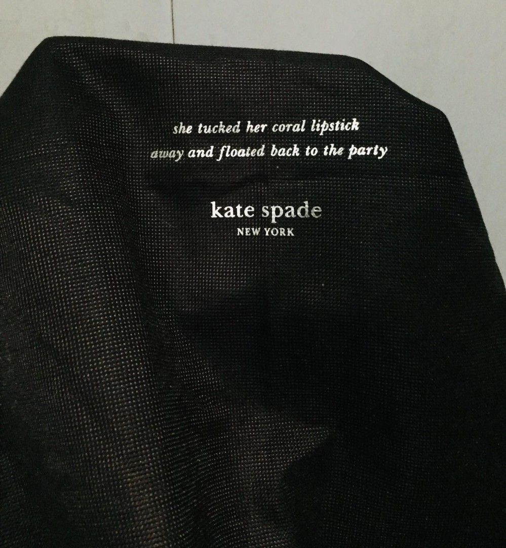Kate Spade New York Dust Bag (Category: Tote Bags) located in Batangas. Submitted by fabufindsstore. (Listing ID 1467290284, Image 2). Description: Authentic Kate Spade dust bag Quality material Features a chic printed quote ("she tucked her coral lipstick away and floated back to the party") with the brand logo underneath Soft fabric material protects your bags from dust and scratches Secure and convenient drawstring top closure 490 only Mode of