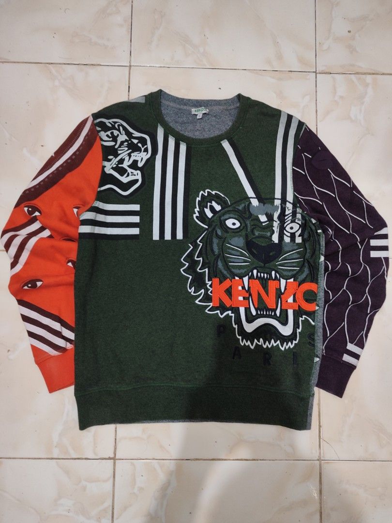 KENZO 2015 MULTI ICON COLLAGE SWEATSHIRT LIMITED EDITION (Category: Luxury Apparel) located in Pagadian. Submitted by miraculouspat (Listing ID 1467273637, Image 1). Description: L 26 W 20 NO ISSUE KENZO IS EMBROIDERED AUTHENTIC.