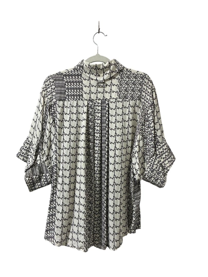 Kenzo Patterned Silk Shirt (Category: Luxury Apparel) located in Santo Tomas. Submitted by tamins.thrifts (Listing ID 1467358132, Image 2). Description: Condition: 9/10 Color Rate: 9/10 Dimensions: 20 x 21 Issue/s:.