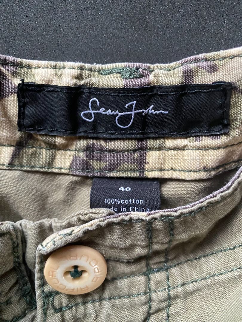 Sean John Green Cargo Shorts (Category: Shorts) located in Naga. Submitted by thrift_emporium (Listing ID 1467271431, Image 2). Description: SIZE ON TAG: 40 DIMENSIONS (W x L): 40 X 28 HEM:12.5 COLOR RATE: 8/10 ISSUE: Minimal Fade PRICE: 750 📌 Item color may vary due to lighting. 📌 Please manage your expectations. 📌 Items are thrifted and not brand new. 📌 we are not affiliated, associated, or in any way officially connected to the following b