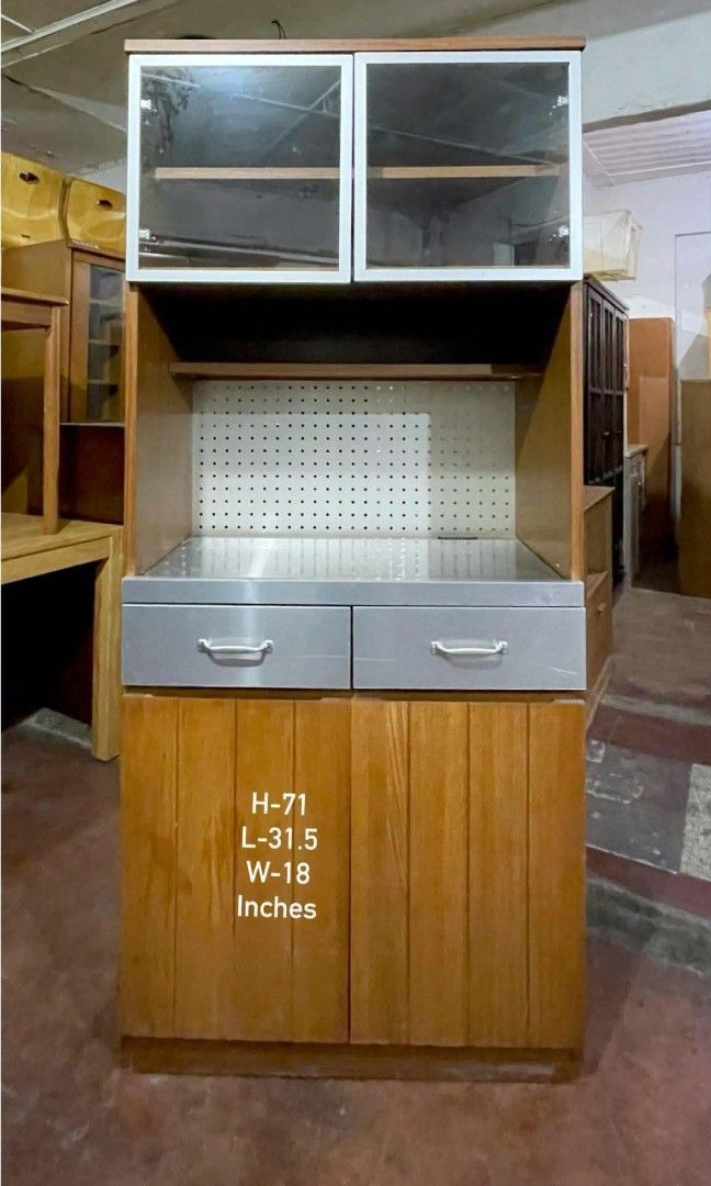 Kitchen Cupboard Display Hutch Cabinet Oven Rack (Category: Shelves, Cabinets & Racks) located in Quezon City. Submitted by dannikkishoppe2 (Listing ID 1467175825, Image 2). Description: Kitchen Cupboard Display Hutch Cabinet Oven Rack ‼️₱9800‼️ ✔️ Sturdy and Durable ✔️ With Pull-Out Tray ✔️ Adjustable Shelves ✔️ Perfect for organizing your kitchen essentials! Please manage your expectations as there might be minimal flaws. Color may vary due to 