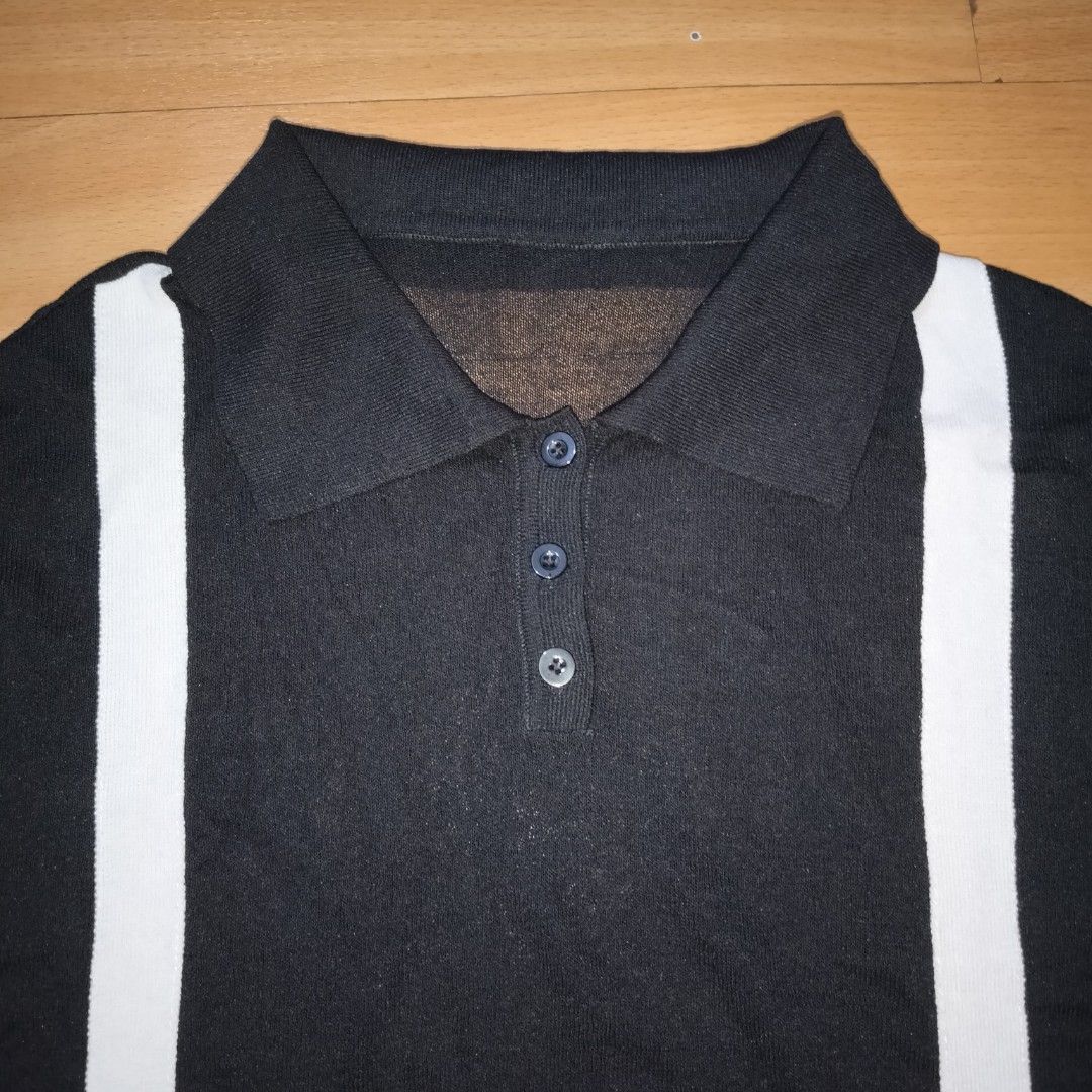 KNITTED BOXY POLO (Category: Tshirts & Polo Shirts ) located in Manila. Submitted by friperie. (Listing ID 1467287378, Image 3). Description: KNITTED BOXY POLO – BLACK & WHITE Upgrade your everyday style with this stylish and timeless knitted polo! 🖤 ✨ Product Details: - Design: Black knitted polo with white vertical accent stripes on the front - Back: Plain black for a clean, minimalist look - Sleeves: Short sleeves with subtle ribbed cuff deta