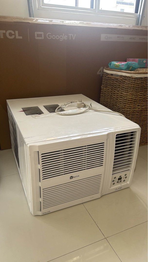 Kolin Quad Inverter Window Type Air Conditioner (Category: Air Conditioning and Heating) located in General Trias. Submitted by ellie__20 (Listing ID 1467236840, Image 2). Description: - Brand: Kolin Quad Inverter Window Type Aircon - Color: Clean White - Display: Digital panel with touch buttons on the front right - Technology: Full DC Inverter for heavy-duty, energy-efficient cooling - Features: Adjustable central louvers and standard plug incl