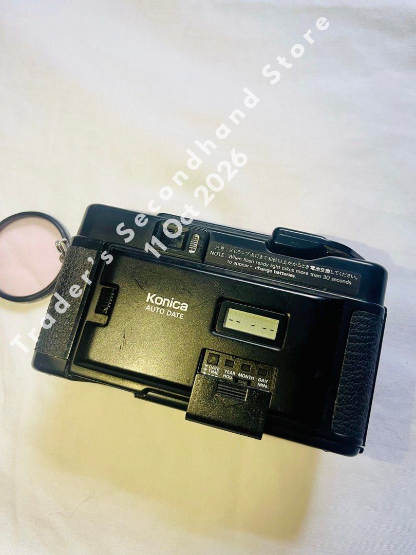 Konica C35 AF2 D Auto Date Film Camera (Category: Cameras) located in Manila. Submitted by traders_2ndhand (Listing ID 1467209799, Image 3). Description: - Model: Konica C35 AF2 D (Black body) - Lens: Built-in Konica Hexanon 38mm f/2.8 - Features: Auto date back, compact point-and-shoot rangefinder style - Format: Uses standard 35mm film - Inclusions: Kenko MC Skylight filter - Condition: Tested and working, working flash and shutter - No test ph