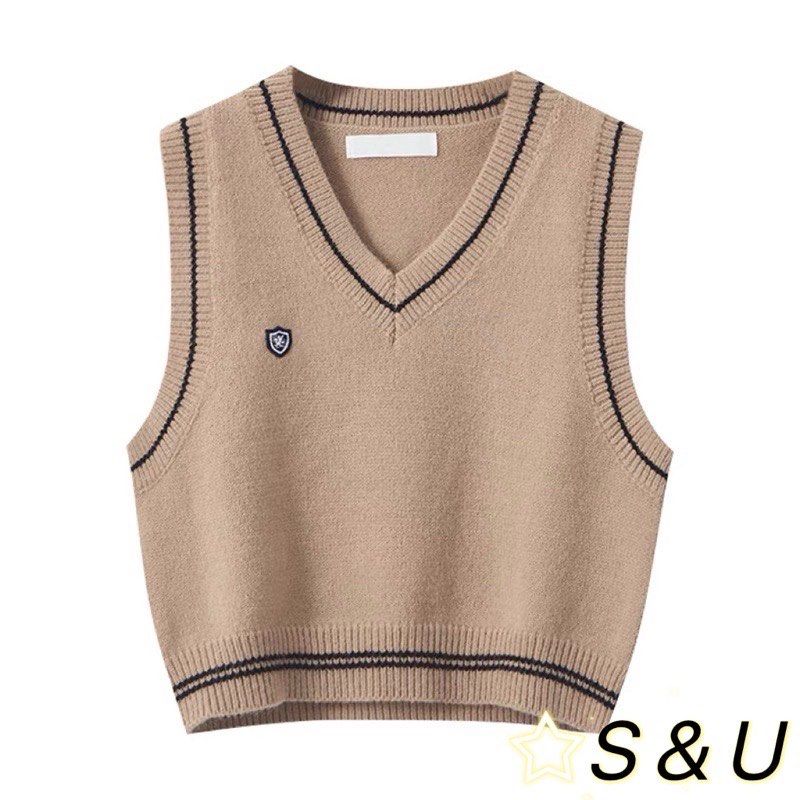 Korean khaki knitted vest (Category: Sleeveless) located in Manila. Submitted by danie_sells (Listing ID 1467240365, Image 3). Description: - Color: Beige with dark stripes - Style: V-neck, cropped knit sweater vest with embroidered chest crest - Fit: Cropped (perfect for layering over collared shirts or tees) - Material: Soft and completely ——— PAYO. Pay As You Order. 💵 MOP: Maribank 🚚 MOD: Lalamove or JnT 📍 Loc: Bacoor, Cavite 📍Alt Loc: Sam
