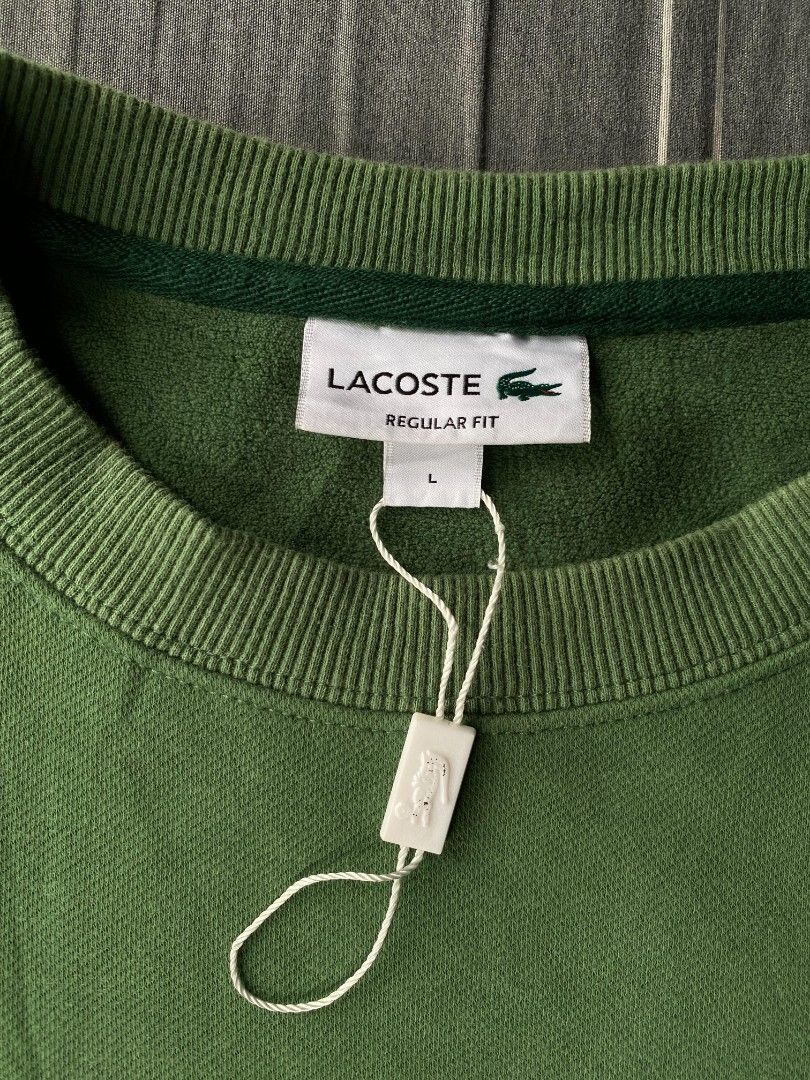Lacoste big logo crewneck (Category: Coats, Jackets and Outerwear) located in Manila. Submitted by raymondrob54698 (Listing ID 1467309816, Image 3). Description: Size large 24x27 no issue.