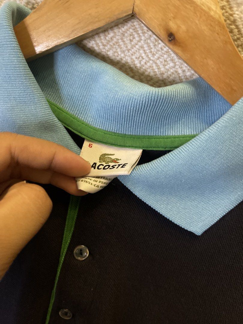 Lacoste blue collar polo shirt (Category: Tshirts & Polo Shirts ) located in Manila. Submitted by hypestock_mnl (Listing ID 1467207471, Image 3). Description: - stylish - perfect for casual wear - great fit - in good condition - minimal signs of usage - 9/10 - money worth! - see pics for details/issue.