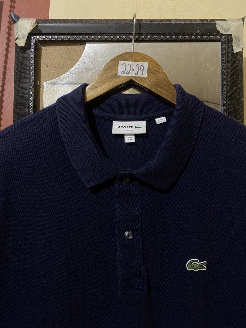 Lacoste Navy Blue (Category: Tshirts & Polo Shirts ) located in Bulacan. Submitted by huntsofryxk (Listing ID 1467239664, Image 3). Description: Lacoste 22/29 size 6 XL on tag color rate 9.8/10 as new condition no issue mine 1700 location: sjdm, bulacan.