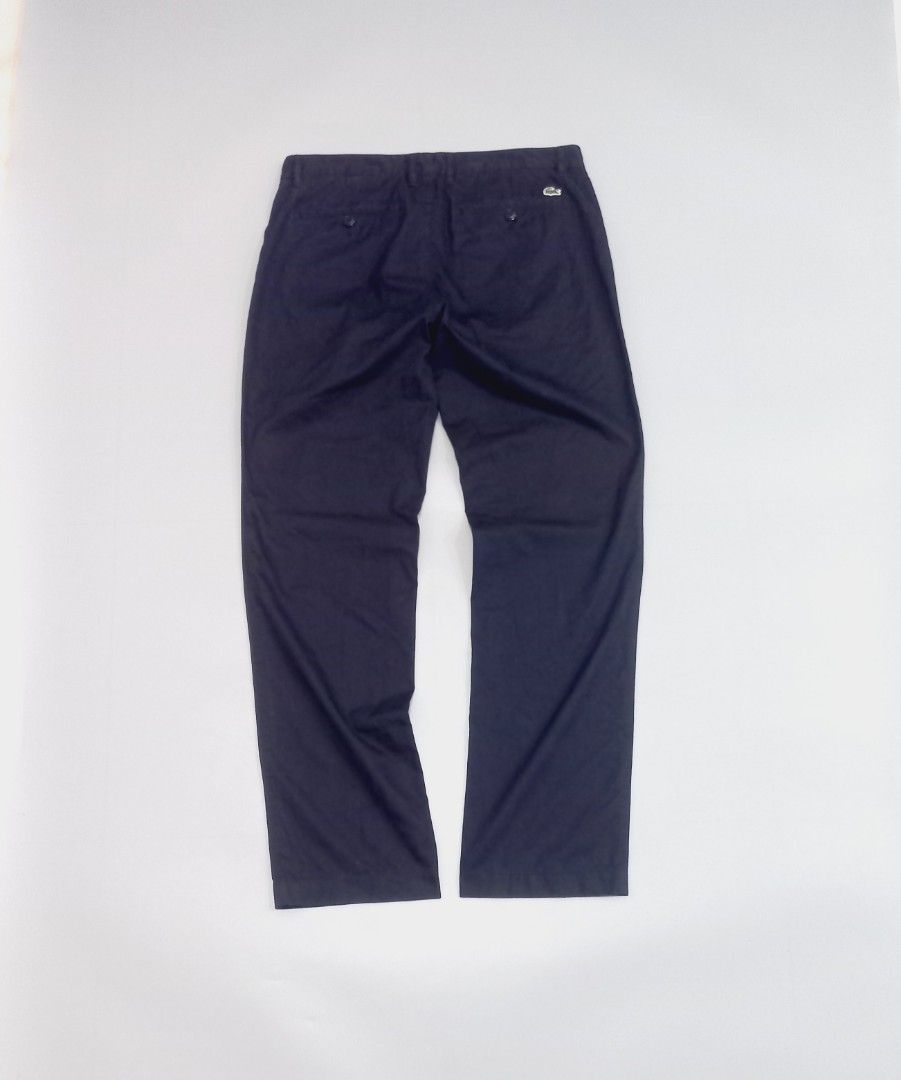 Lacoste Chinos Pants (Category: Chinos) located in Cebu City. Submitted by MrLiks_123 (Listing ID 1467227235, Image 1). Description: Lacoste chinos in a classic straight fit. Features back welt pockets, button closure, and the iconic embroidered crocodile logo. Well-kept and versatile for casual or smart-casual wear. Size 32" 33 In great condition.
