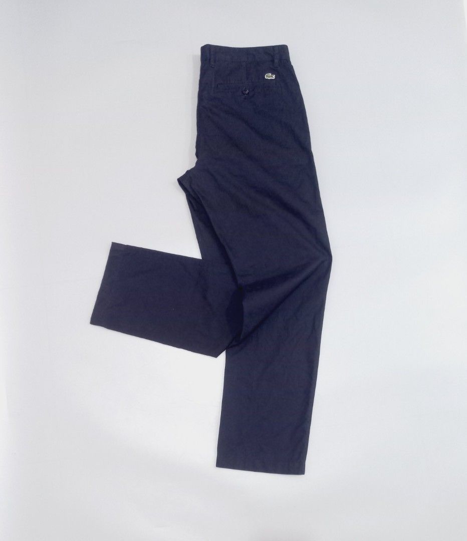 Lacoste Chinos Pants (Category: Chinos) located in Cebu City. Submitted by MrLiks_123 (Listing ID 1467227235, Image 3). Description: Lacoste chinos in a classic straight fit. Features back welt pockets, button closure, and the iconic embroidered crocodile logo. Well-kept and versatile for casual or smart-casual wear. Size 32" 33 In great condition.