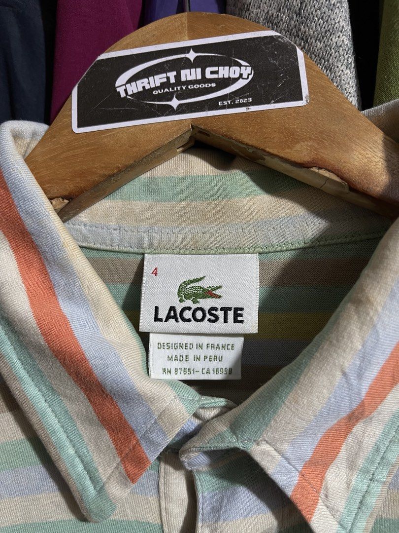 Lacoste Poloshirt Multi Color (Category: Tshirts & Polo Shirts ) located in Cabuyao City. Submitted by jeirussamson897 (Listing ID 1467229017, Image 2). Description: Lacoste Poloshirt Multi Color size 4 22 width 28 length excellent condition has minimal stains (not noticeable) needwash 8.5-9/10 399+sf.