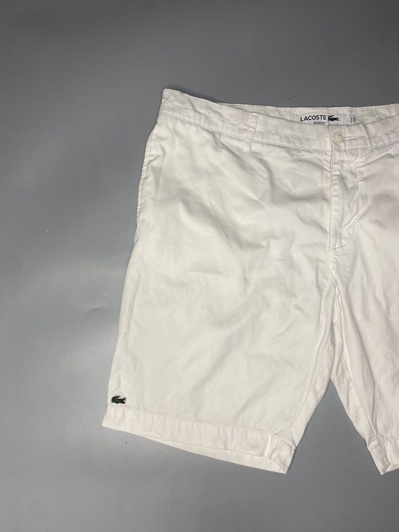 Lacoste Slim fit Chino Shorts (Category: Shorts) located in Bago City. Submitted by jg_finds_ (Listing ID 1467322979, Image 2). Description: size 38 on tag Waist- 38 inch Length- 19 inch Hem- 10.5 inch Excellent.