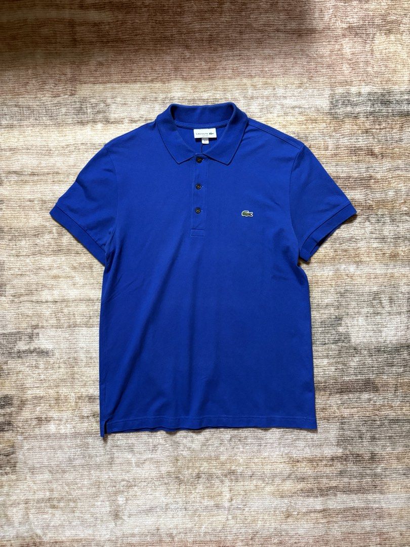 Lacoste Slimfit Blue Poloshirt (Category: Tshirts & Polo Shirts ) located in Antipolo. Submitted by thearchivesproject (Listing ID 1467320311, Image 1). Description: Like New 19 width 27.5 length.