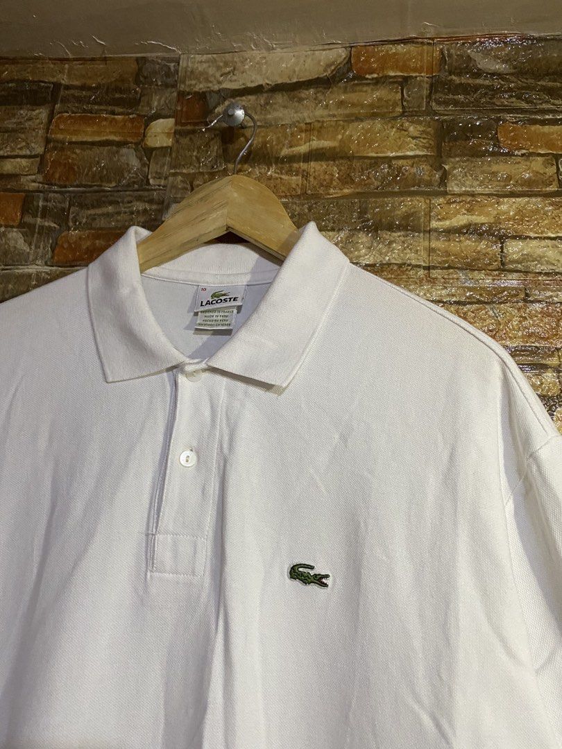 Lacoste white polo shirts (Category: Tshirts & Polo Shirts ) located in Cebu City. Submitted by arsenyong (Listing ID 1467304905, Image 2). Description: 24 by 29 Excellent 9.5/10 color ate Issue: minimal stain /washable Need wash only .
