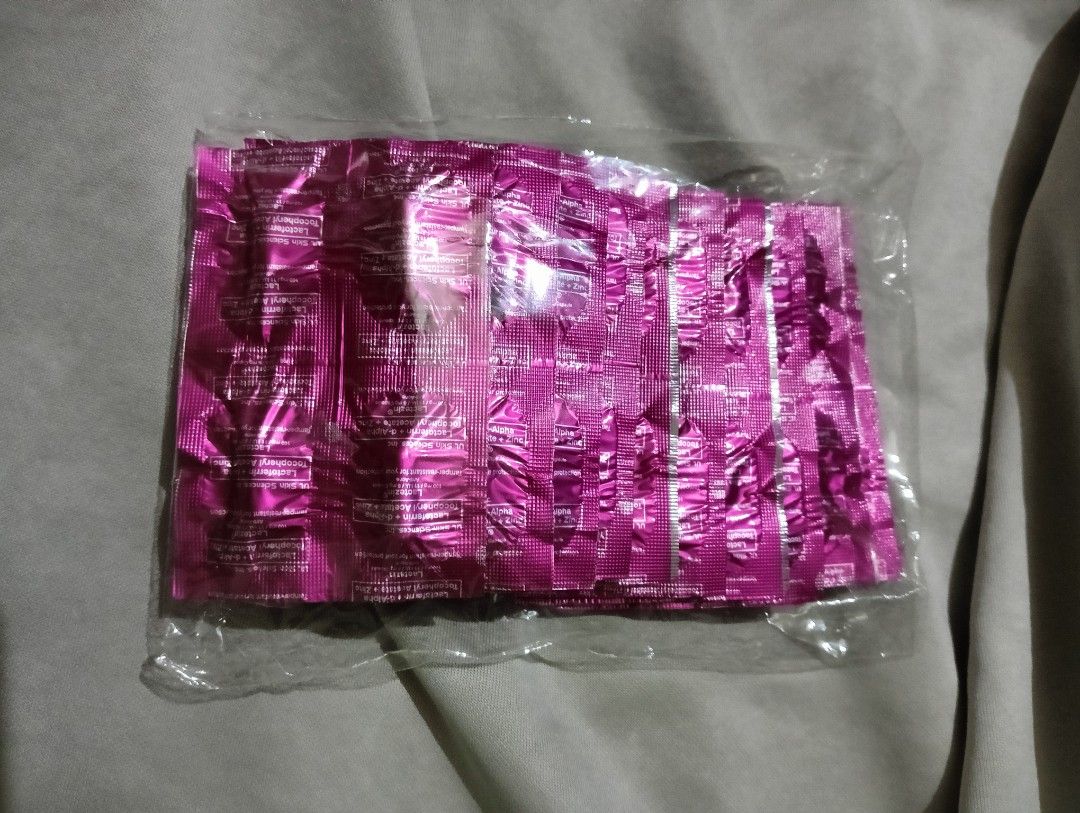 Lactezin UL Skin Sciences Blister Packs (Category: Face Care) located in Manila. Submitted by rej.24 (Listing ID 1467237139, Image 2). Description: 40pcs - Brand: Lactezin by UL Skin Sciences Inc. - Key Ingredients: Lactoferrin, d-Alpha Tocopheryl Acetate, and Zinc - Condition: Brand new, unopened, and sealed in pink blister packs - Expiry Date: 09/2027 (stamped on the back) - Packaging: Securely packed in clear plastic - Status: On hand and read