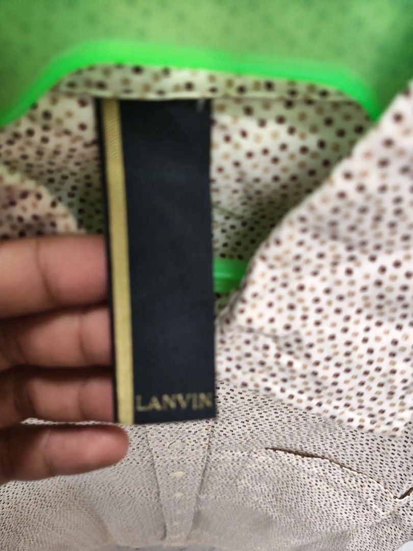 Lanvin button down Polo shirt (Category: Formal Shirts) located in Cabadbaran. Submitted by jem1124 (Listing ID 1467225996, Image 2). Description: 21 width 30 front length 32 back length excellent condition No issue.