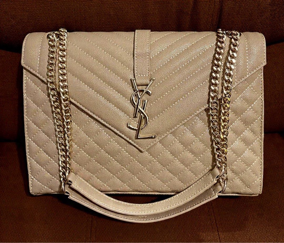 Large YSL Envelope 2way Bag (Category: Shoulder Bags) located in Quezon City. Submitted by chic.bags (Listing ID 1467200476, Image 1). Description: With etiketa Caviar leather With dust bag Good as new No issue Japan preloved Actual photo posted Mop: gcash.