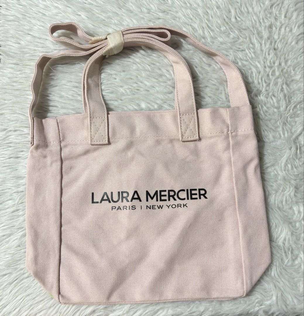 Laura Mercier canvas 2-way mini tote bag (Category: Tote Bags) located in Paranaque City. Submitted by dalle_closet (Listing ID 1467189231, Image 2). Description: size: 11 x 8.5 inches new pa ito canvas material.