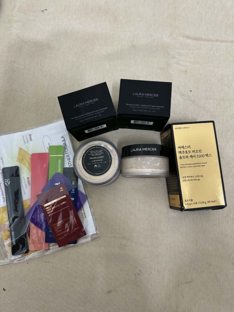 Laura Mercier Translucent Setting Powder and Esther Formula Supplements (Category: Makeup) located in Angeles City. Submitted by measaliman02351 (Listing ID 1467333442, Image 1). Description: - Laura Mercier Translucent Loose Setting Powders: Total of 3 jars (2 boxed, 1 unboxed) - Esther Formula Brewer's Yeast Biotin: 1 sealed box included - Bonus: 1 bag of assorted wellness supplement packets - Condition: 100% brand new, unopened, and unused - A