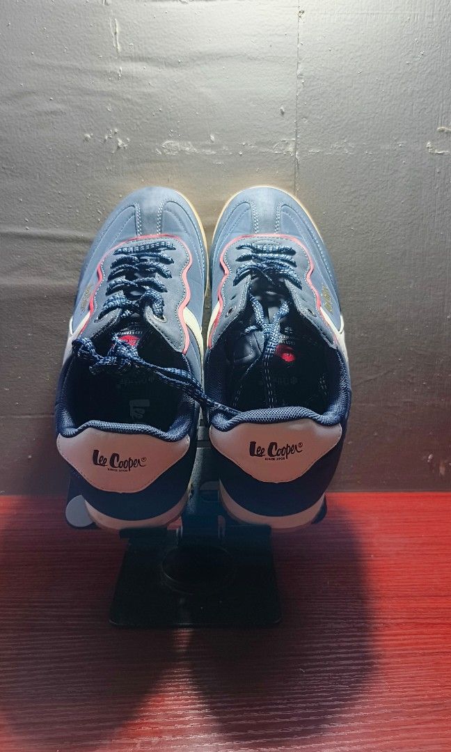 Lee coopers (Category: Sneakers) located in Manila. Submitted by reytambuco24 (Listing ID 1467312485, Image 3). Description: Color: Navy Blue / White / Red Brand: Lee Cooper Style: Casual Retro Sneakers Closure: Lace-Up Sole: White Midsole with Gum Outsole.