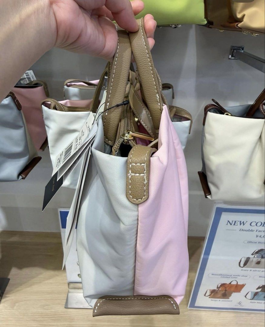Legato largo sakura double face (Category: Sling Bags) located in Quezon City. Submitted by jptrc (Listing ID 1467349377, Image 2). Description: Legato largo limited edition sakura Mini shoulder bag color pink & gray Comes with heart charm and tag Brand new from japan Never been used .