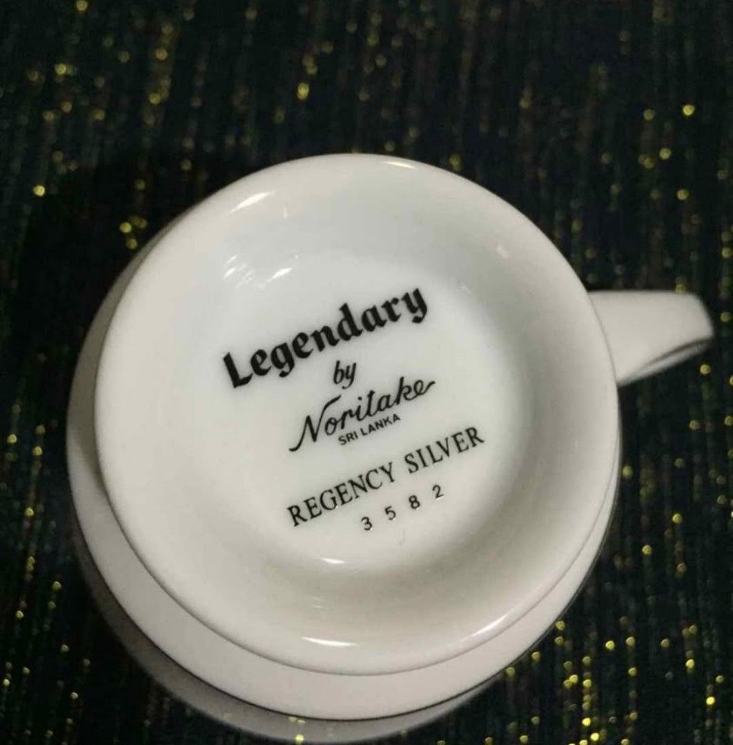 Legendary by Noritake Regency Silver 18-Piece Tea Set (Category: Coffee & Tea Tableware) located in Cainta. Submitted by veronica2277 (Listing ID 1467269587, Image 3). Description: Complete vintage 18-piece tea set from the Debenhams Collection. Includes six tea cups, six tea saucers, and six tea plates. Fine china crafted in Sri Lanka. White design with delicate silver trim. Original box included. Great for hosting guests or daily afternoon tea.