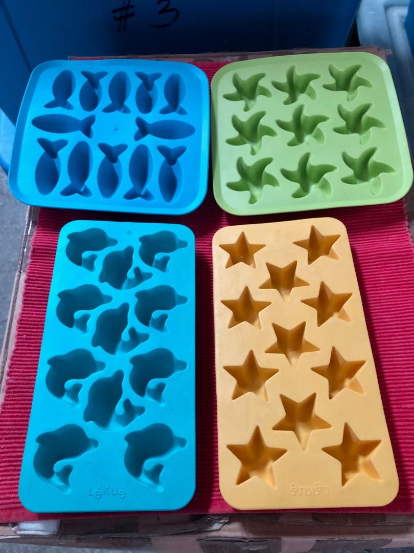 Lekue & IKEA Silicone Ice Cube Trays in 4 Shapes (Category: Dinnerware & Cutlery) located in Calamba. Submitted by marjoh29436 (Listing ID 1467242541, Image 1). Description: Set of Lékué and IKEA silicone ice cube trays in bright colors. It is IKEA - fish and starfish shapes / Lékué - dolphin and star shapes. Flexible material makes popping out ice easy. Great for parties, cocktails, or kids' drinks. Clean and ready to use. Not USED, clean, well 