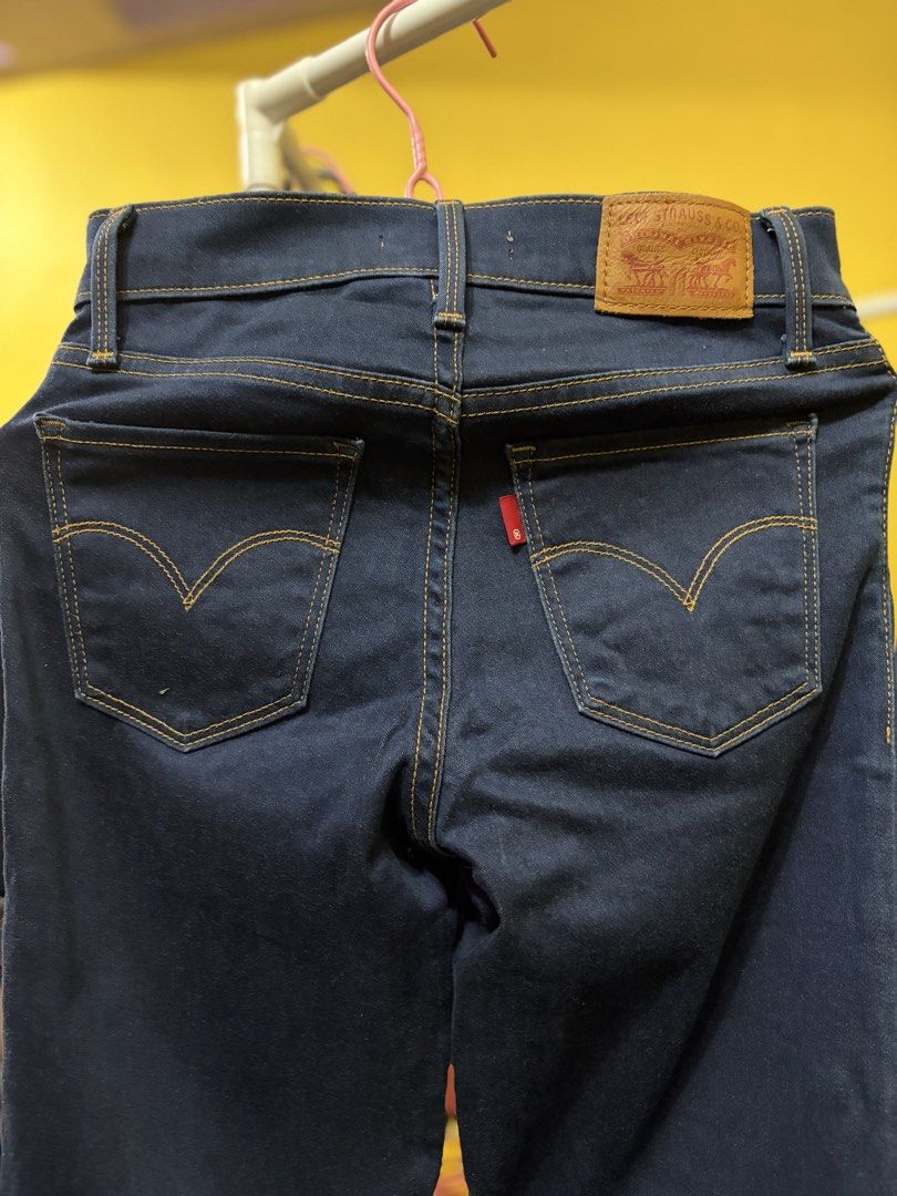 Levi's 312 Shaping Slim Jeans (Category: Jeans) located in Calamba. Submitted by handpickedbynetty (Listing ID 1467224217, Image 3). Description: - Brand/Model: Levi's 312 Shaping Slim Jeans - Wash: Dark wash denim - Size: 24 - Features: Classic five-pocket styling, contrast stitching, and back leather patch - Fit: Flattering, curve-hugging design.