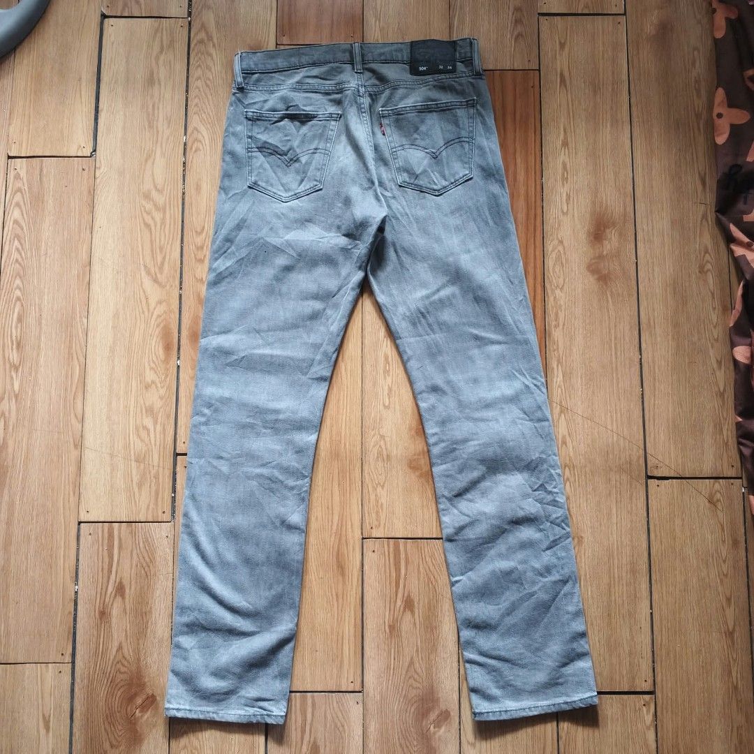 Levi's 504 Regular Straight Jeans Grey Size 32x34 (Category: Jeans) located in Paranaque City. Submitted by thriftine5 (Listing ID 1467213567, Image 2). Description: - Brand: Levi's - Style: 504 Straight Fit Jeans - Color: Faded grey wash with natural thigh whiskering - Size: 32x34 - Details: Classic 5-pocket styling, zip fly, button closure, and leather back patch - Material: Sturdy, high-quality denim.