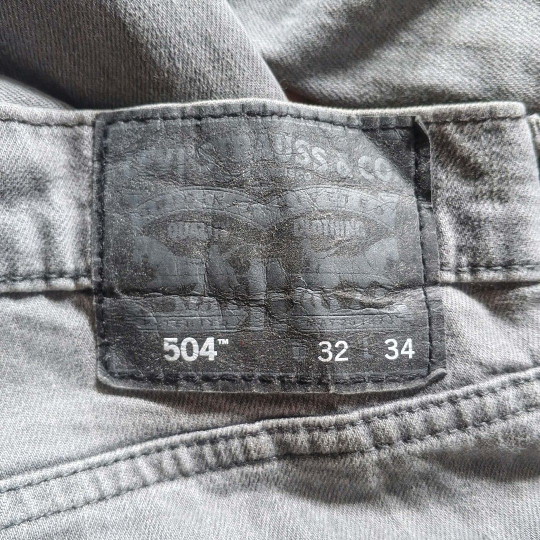 Levi's 504 Regular Straight Jeans Grey Size 32x34 (Category: Jeans) located in Paranaque City. Submitted by thriftine5 (Listing ID 1467213567, Image 3). Description: - Brand: Levi's - Style: 504 Straight Fit Jeans - Color: Faded grey wash with natural thigh whiskering - Size: 32x34 - Details: Classic 5-pocket styling, zip fly, button closure, and leather back patch - Material: Sturdy, high-quality denim.