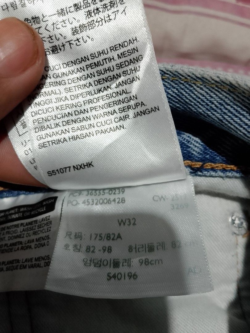 Levi's 511 Patchwork Denim Shorts Size 32 (Category: Shorts) located in Iloilo. Submitted by janillthrifted (Listing ID 1467332859, Image 3). Description: Levi's 511 denim shorts with distressed details and colorful patchwork panels on the front and back. Size 32 waist. Button fly, classic five-pocket styling, and branded leather back patch. Unique custom look..
