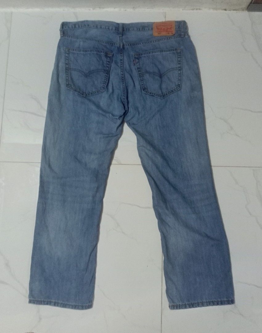 Levi's 559 Relaxed Straight Jeans size 38 (Category: Jeans) located in Taguig. Submitted by mvdsh0p2022 (Listing ID 1467199708, Image 2). Description: - Brand: Levi's - Style: 559 Relaxed Straight Fit - Size: Waist 36, Length 30 - Color/Wash: Light blue with natural fading - Details: Classic 5-pocket styling, zip fly, leather back patch - Eco-friendly: Water<Less collection tag inside - Origin: Made in Bangladesh - Condition: Clean denim, ready t