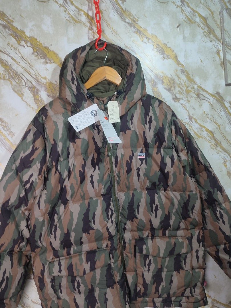 Levi's Camouflage Puffer Jacket Down Winter Coat (Category: Coats, Jackets and Outerwear) located in Cabuyao City. Submitted by jederama (Listing ID 1467272516, Image 2). Description: LEVIS PERFORMANCE PUFFER JACKET SIZE : LARGE ON TAG WIDTH - 25 LENGTH - 31 WATER REPELLENT BRAND NEW WITG TAG NO ISSUE / NO FLAWS AUTHENTIC 💯 1,900 + SHIPPING FEE.