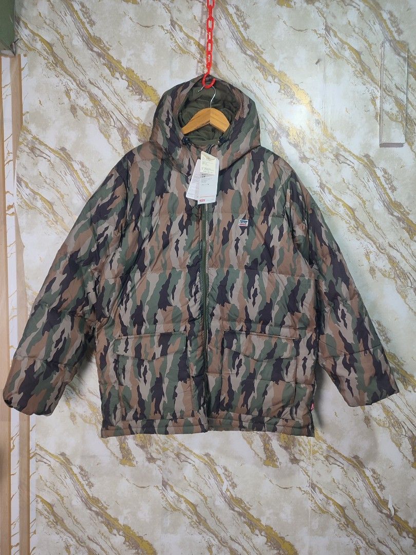 Levi's Camouflage Puffer Jacket Down Winter Coat (Category: Coats, Jackets and Outerwear) located in Cabuyao City. Submitted by jederama (Listing ID 1467272516, Image 1). Description: LEVIS PERFORMANCE PUFFER JACKET SIZE : LARGE ON TAG WIDTH - 25 LENGTH - 31 WATER REPELLENT BRAND NEW WITG TAG NO ISSUE / NO FLAWS AUTHENTIC 💯 1,900 + SHIPPING FEE.